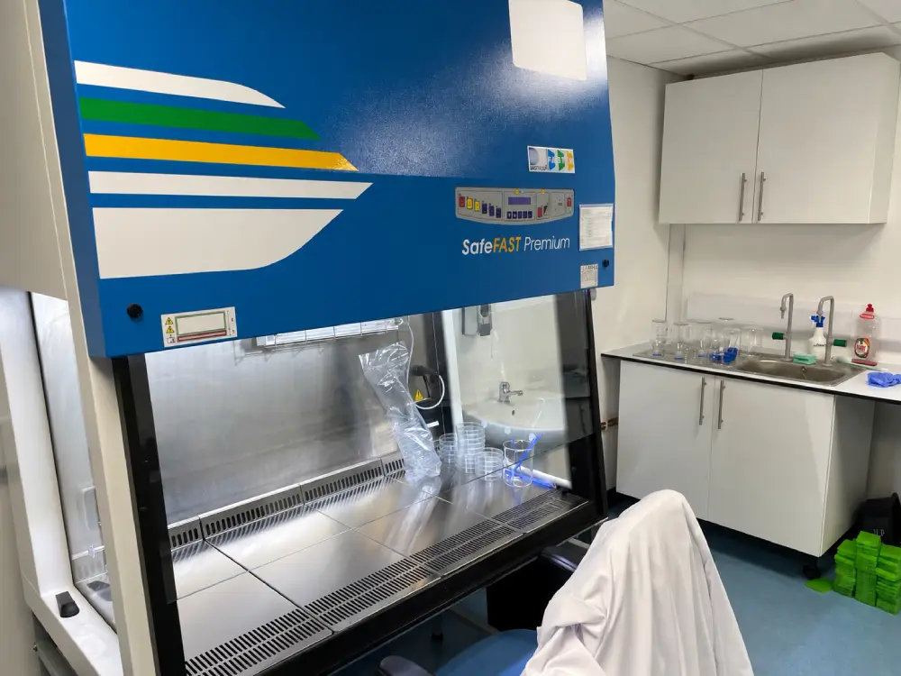 Operator working with controlled manufacturing equipment